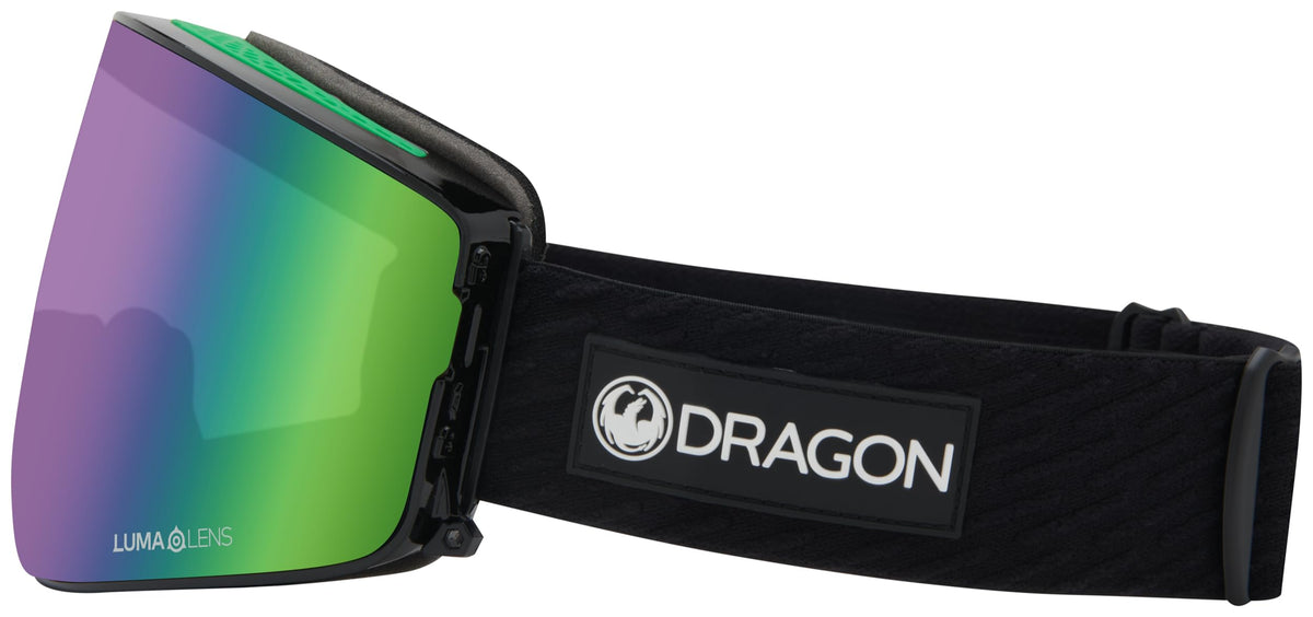 Side view of black snow goggles with mirrored green lens and DRAGON strap