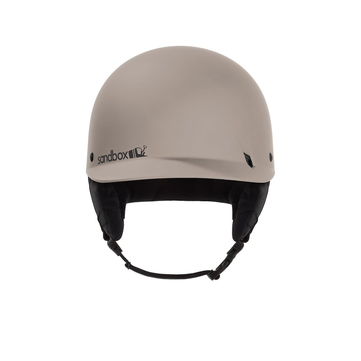 Matte beige snow helmet front view with black chin strap; Sandbox logo on band.