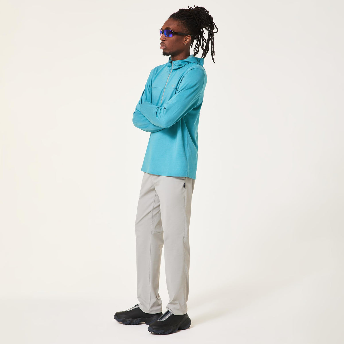 Men's blue hoodie with hood and front zipper, side view, long sleeves