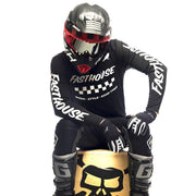 Black long-sleeve motocross jersey with Fasthouse front logo and checkered band