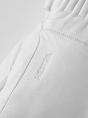 Hestra Idre wool mittens in white, with stitched leather palm and thumb patch
