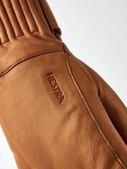 Cork brown wool mittens detail, Hestra logo stitched on leather palm panel