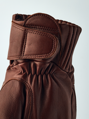 Brown leather wool mittens with stitched thumb panel and pleated cuff