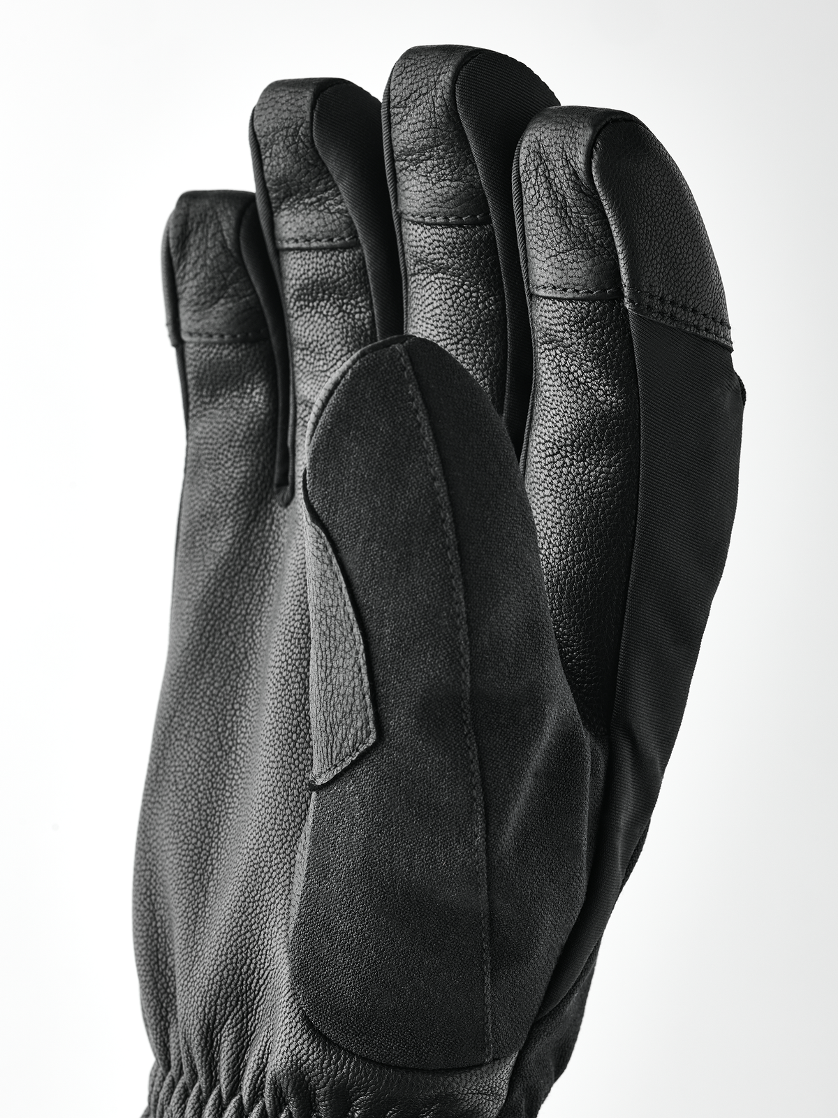 Black leather powder short gloves with stitched fingers and textured wrist