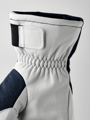 White powder short gloves with black cuff strap and molded finger seams