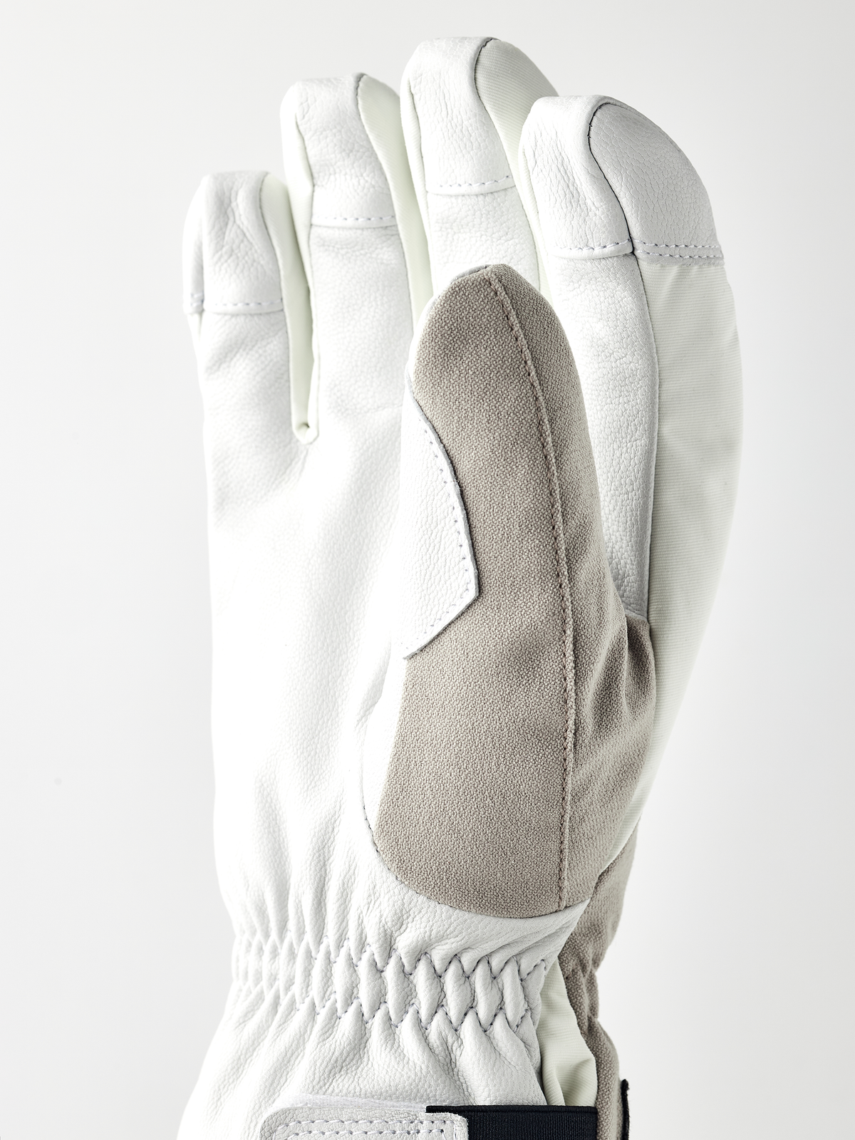 White powder short gloves with gray leather palm panel and knit wrist
