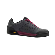 Women’s cycling shoe in dark gray with berry laces, perforated toe, and grippy sole