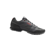 Giro lace-up trail shoe in dark gray/black with breathable mesh and red logo