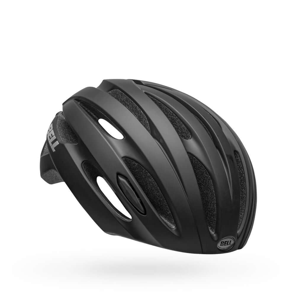 Matte black bike helmet with vent channels, oval openings, and BELL logo at front edge