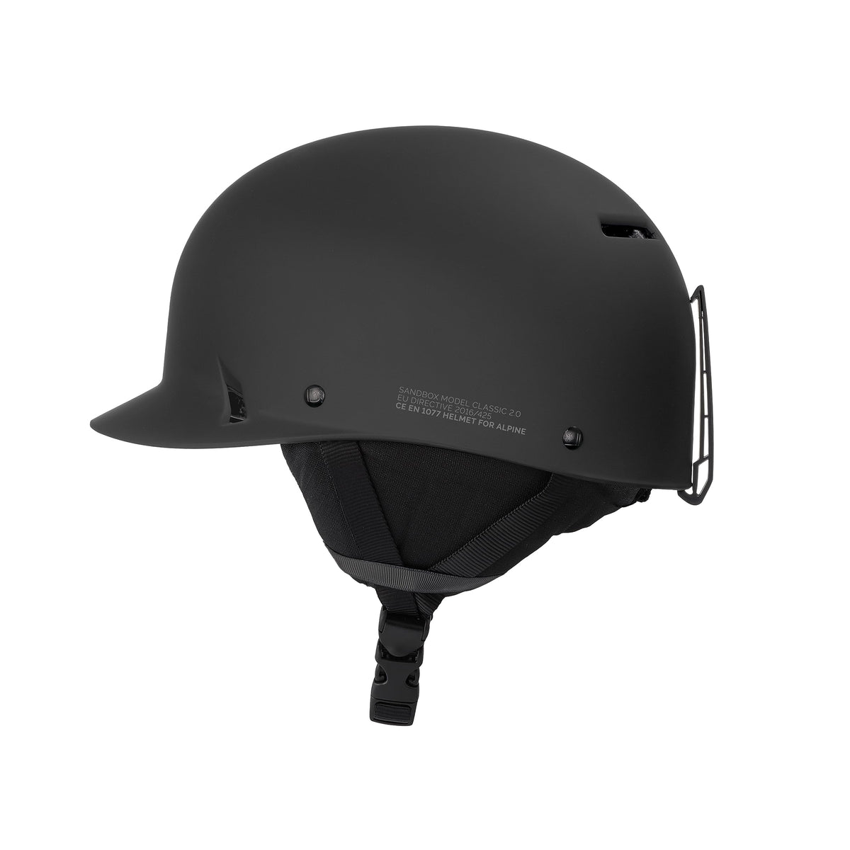 Black snow helmet with side chin strap and rear ventilation openings.