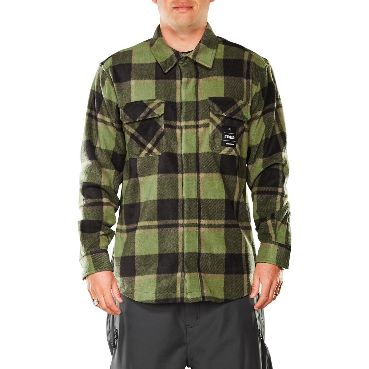 Men's green and black plaid flannel button-up shirt with chest pockets