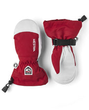 Hestra junior waterproof ski mittens in red and white, with wrist strap and loop.