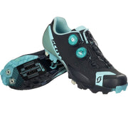 Women’s MTB RC cycling shoe in matte black with turquoise accents and rugged tread