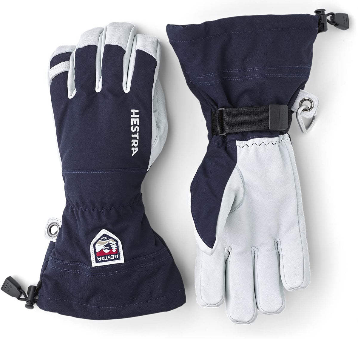 Navy and white Hestra leather ski gloves with wrist strap, stitched cuff, and ring
