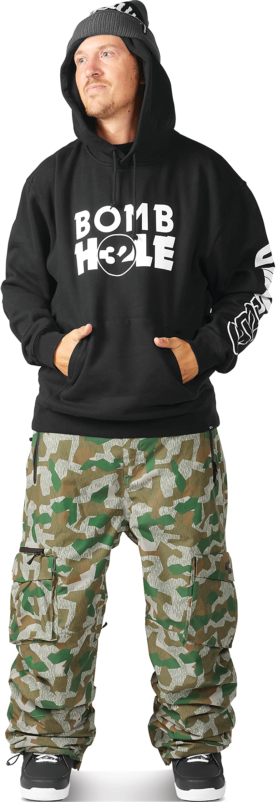 Men's camo snow cargo pants shown with drawstring ankle cuffs and cargo side pockets