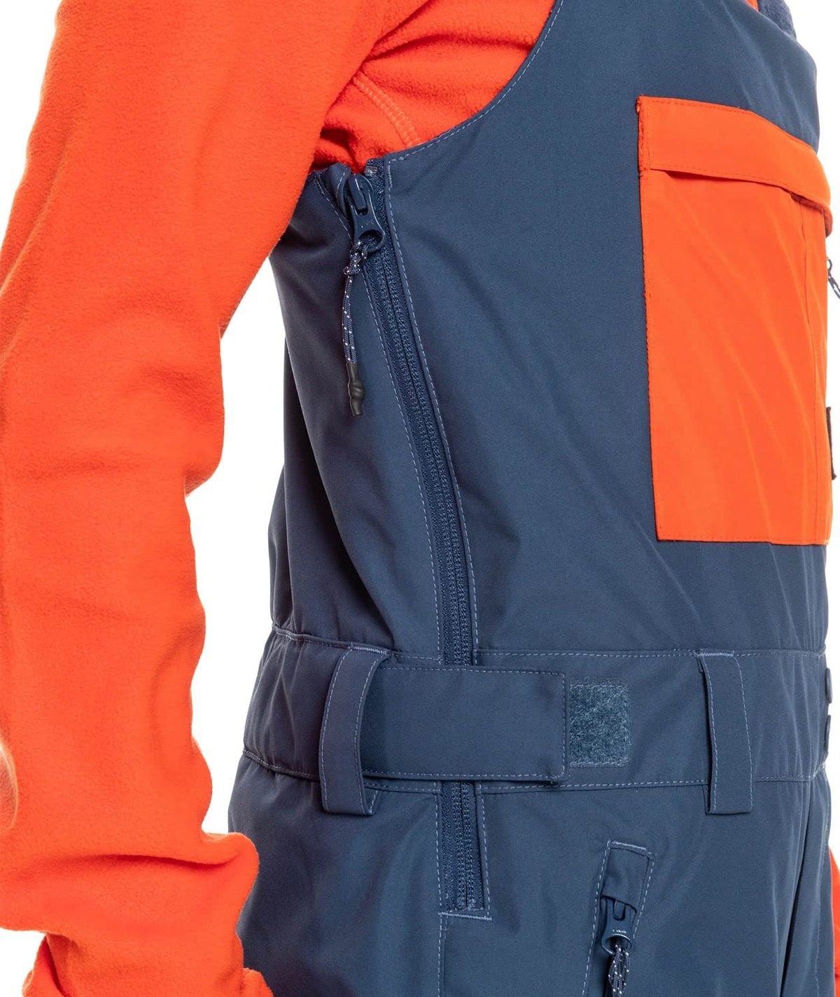 Boys' insulated snowboard bib overalls, orange top with blue bib, front zipper and pockets