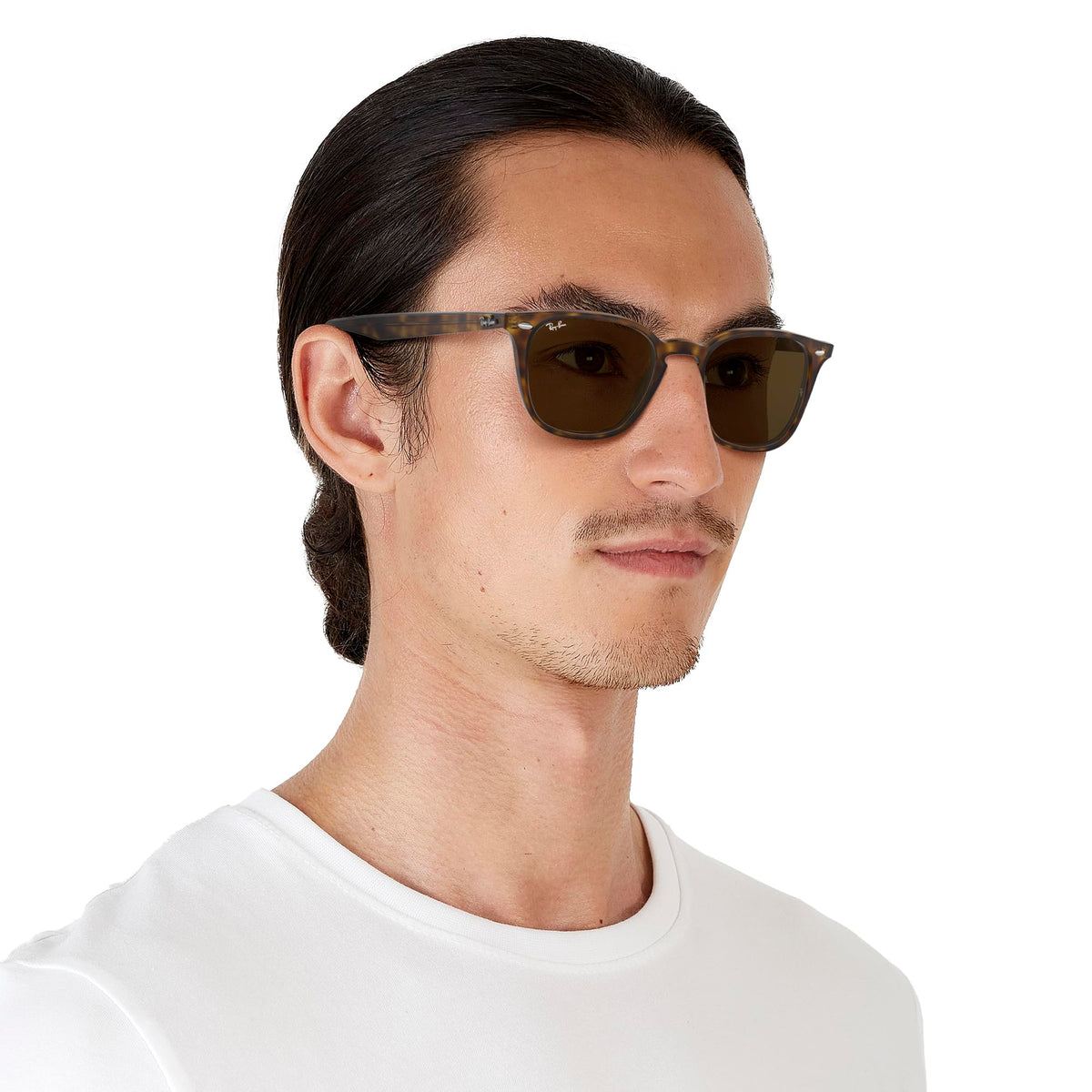 Ray-Ban RB4258F low-bridge fit sunglasses on model, dark frames with brown lenses