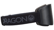 Black snow goggles with dark lens and DRAGON text across wide OTG strap