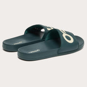 Men's slide sandals, dark teal with white Oakley logos on footbed and strap