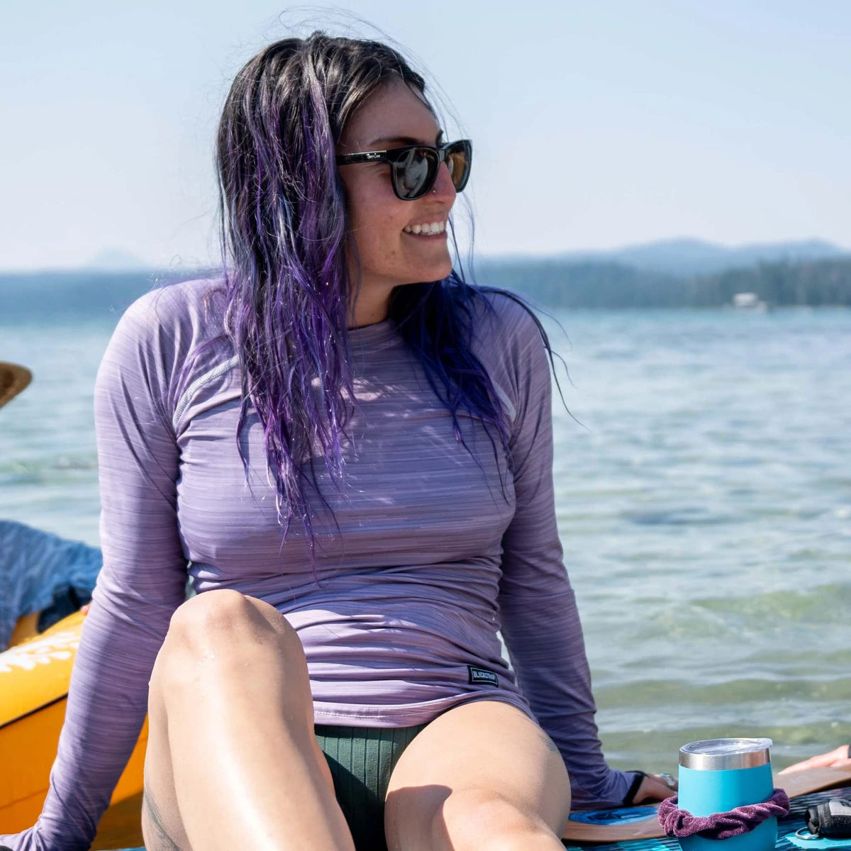Women’s UV crew top in mauve heather, long sleeves worn by model