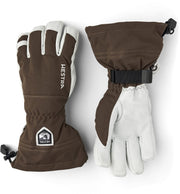 Brown and white Hestra leather ski gloves with wrist strap and snap cuff details