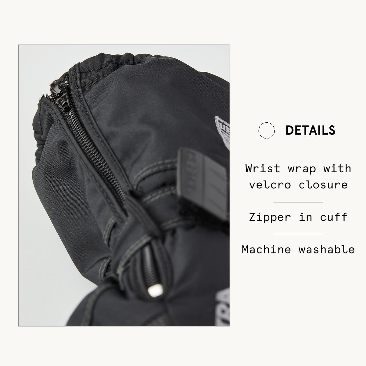Black baby zip long mitt cuff with zipper opening and elastic wrist wrap