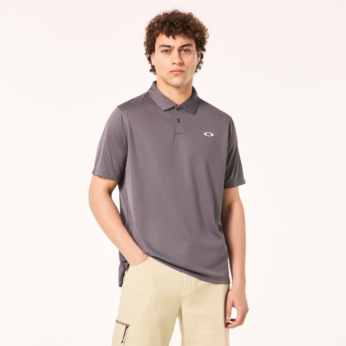 Men's dark gray polo shirt with short sleeves, collar, and Oakley chest logo