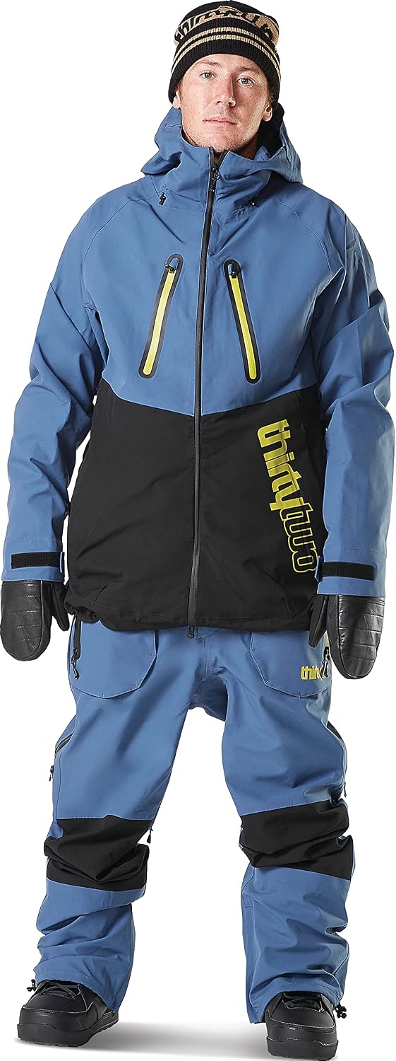 Men's TM-3 snow jacket in blue with black panels, zip front, adjustable hood