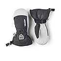 Two-tone black and white Hestra junior waterproof ski mittens, paired with pull strap.