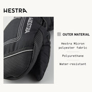 Close-up of black baby long mitt with perforated palm panels and stitched trim