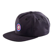 Troy Lee Designs carbon snapback hat with circular logo patch