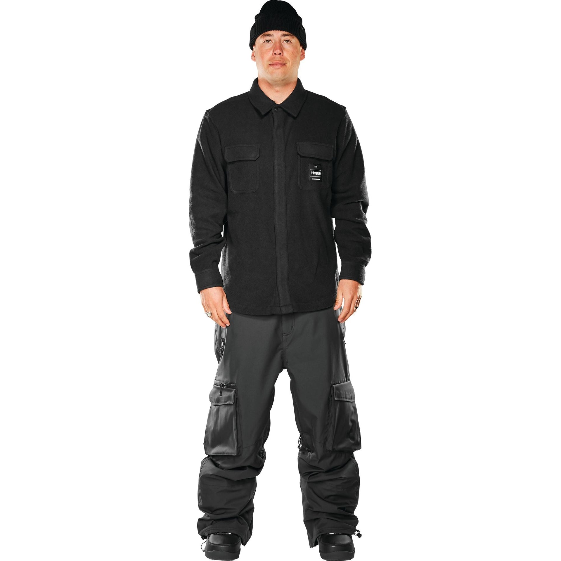 Black button-up flannel overshirt with point collar and chest flap pockets, long sleeves