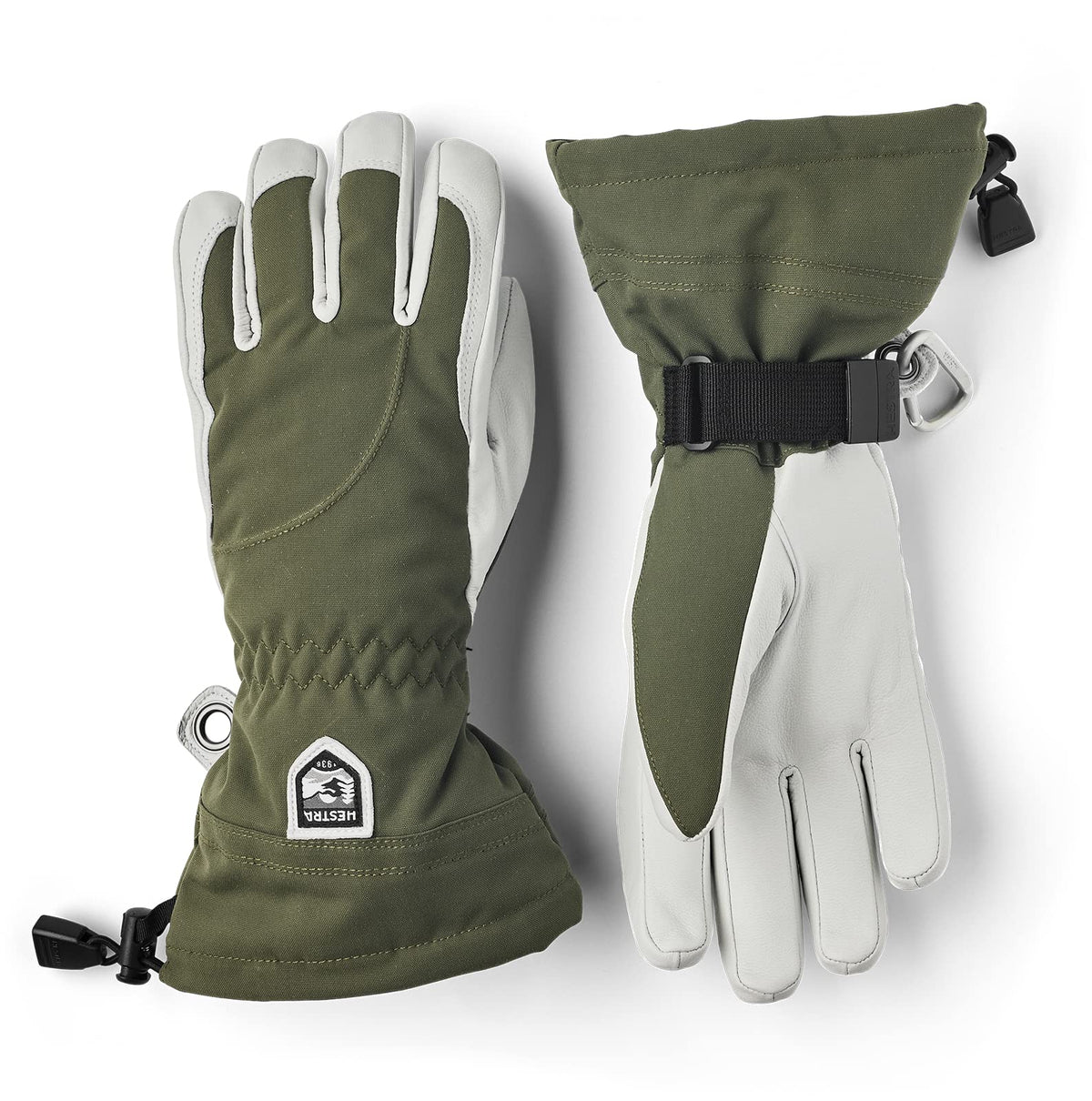 Hestra women’s heli-ski gloves in olive green with offwhite fingers, wrist pull strap