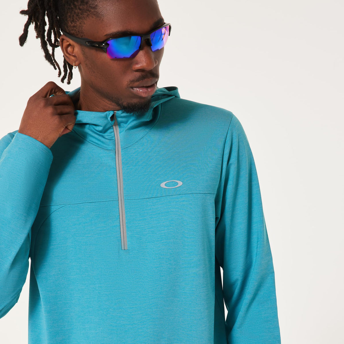 Blue men's hoodie close-up with hood, front zipper, small chest logo