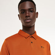 Men's orange polo shirt on model, showing fold-over collar and button placket