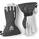 Dark gray Hestra leather ski gloves with white palm, wrist strap, and pull loop