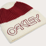 Folded knit beanie with cream base, dark red stripe, and 'Oakley' logo