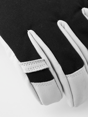 Black and white ski glove with stitched finger panels and split thumb section