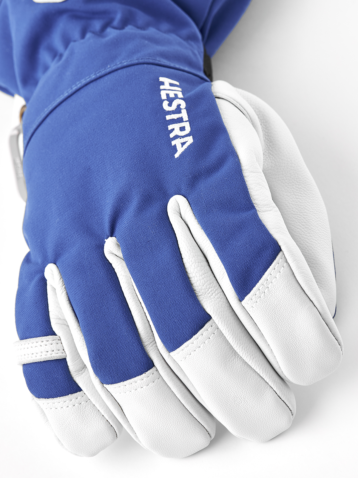 Blue and white ski gloves with padded fingers and curved hand seam