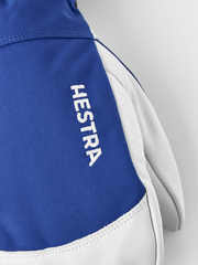 Blue ski mitten cuff with embroidered HESTRA text and white leather trim