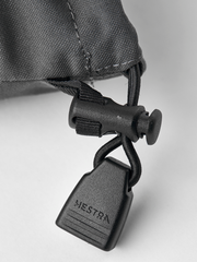 Grey Hestra ski mittens with black cord lock and fastening strap at wrist
