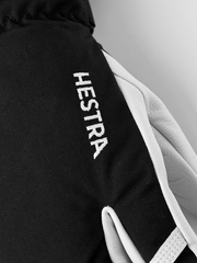 Hestra Army Leather Heli Ski 3-finger gloves in black with white leather palm panels