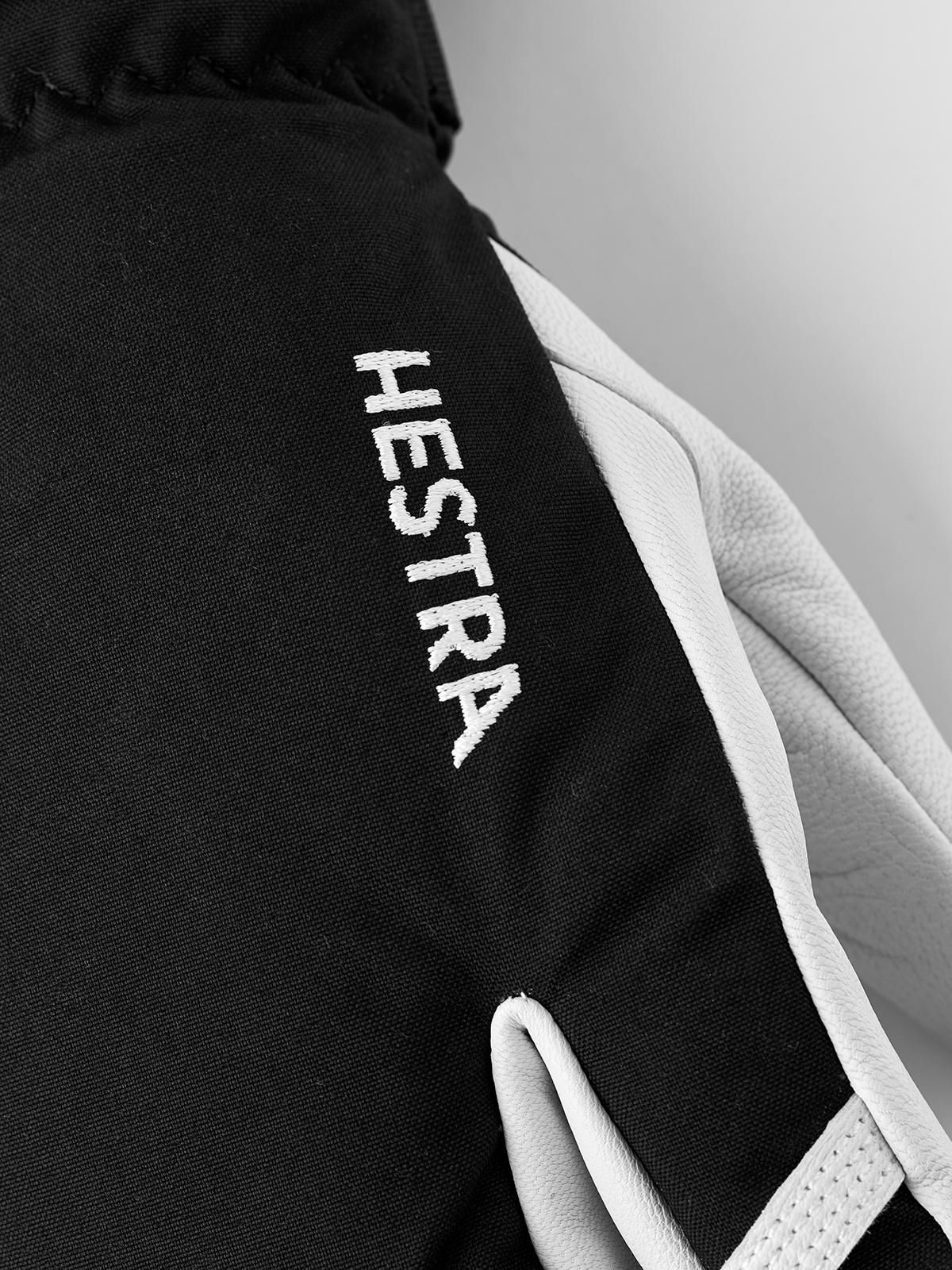 Hestra Army Leather Heli Ski 3-finger gloves in black with white leather palm panels
