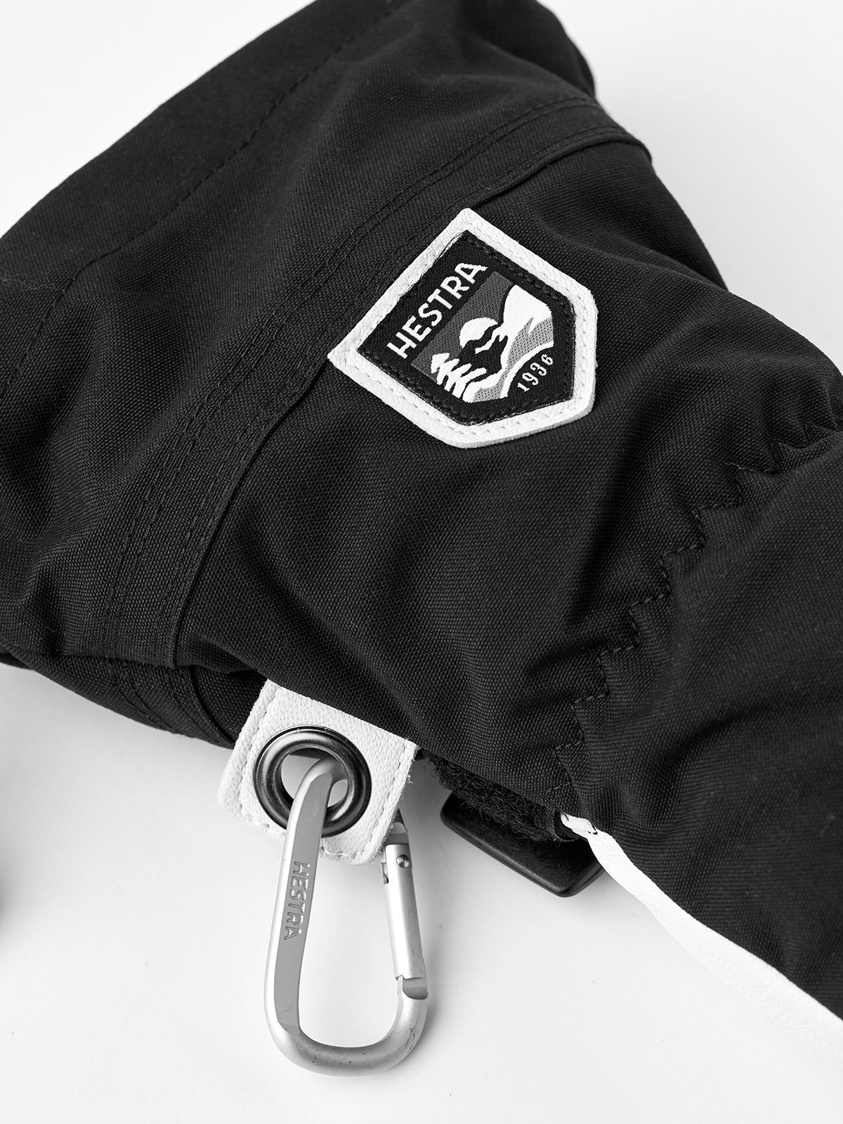 Hestra Army Leather Heli Ski 3-finger gloves in black with metal carabiner clip