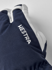Navy 3-finger ski gloves with white Hestra print and white leather finger area