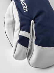 3-finger ski glove with navy fabric back and white leather fingertips and palms.