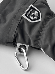 3-finger ski gloves in dark grey with HESTRA logo patch and metal clip.