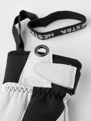 Black patrol gloves with white leather panel and hook-and-loop wrist strap detail.