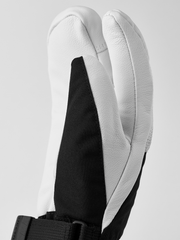 White ski glove with dark palm panel and black elastic cuff strap detail