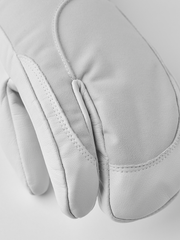 Women’s white ski gloves with padded fingers and quilted palm panel